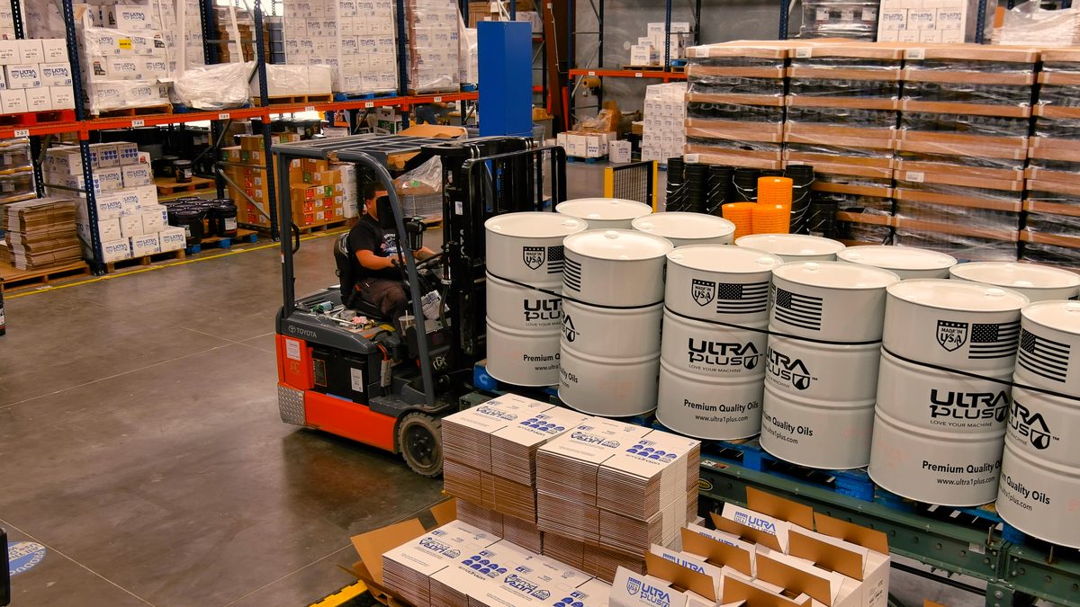 Forklift operations in U1Dynamics lubricant warehouse
