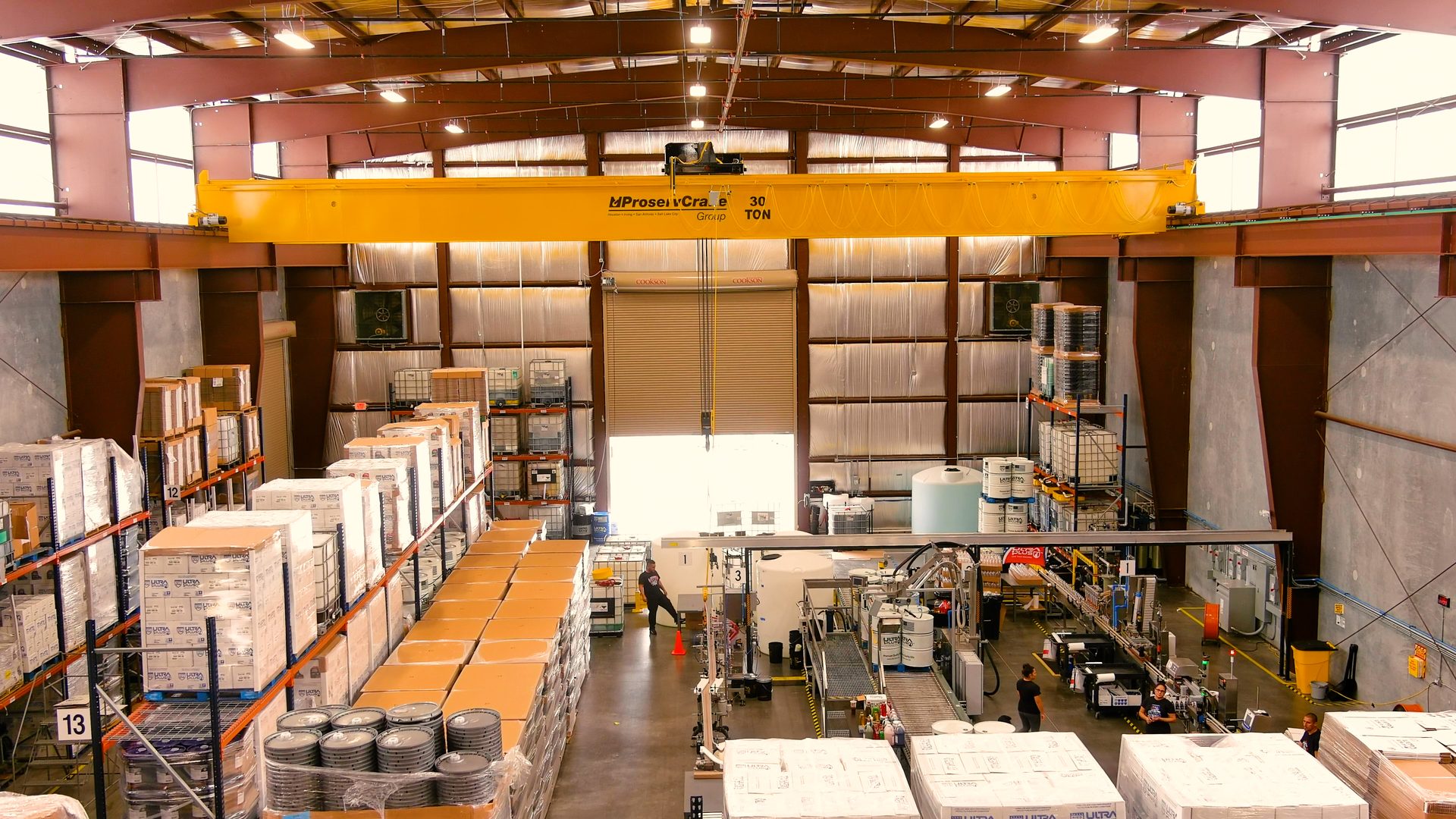 U1Dynamics warehouse with overhead crane for drum and tote handling